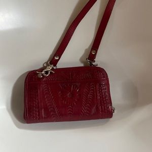 Tooled red leather hand bag/wallet with shoulder strap